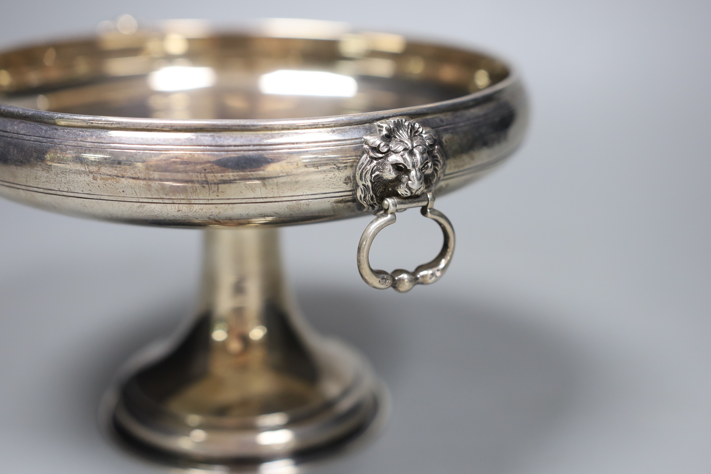 A George V silver pedestal bowl, with lion-mask handles, London 1924, 18cm. diam.